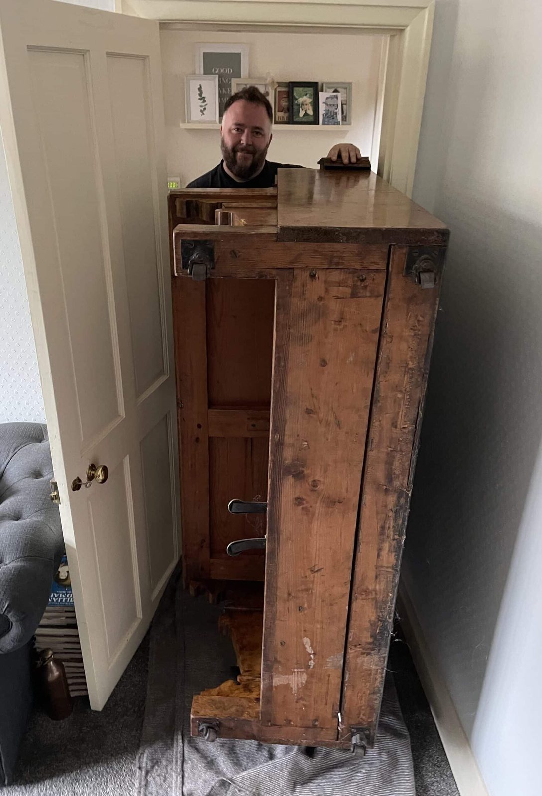 Carrying a piano out of a Yorkshire home and up external steps