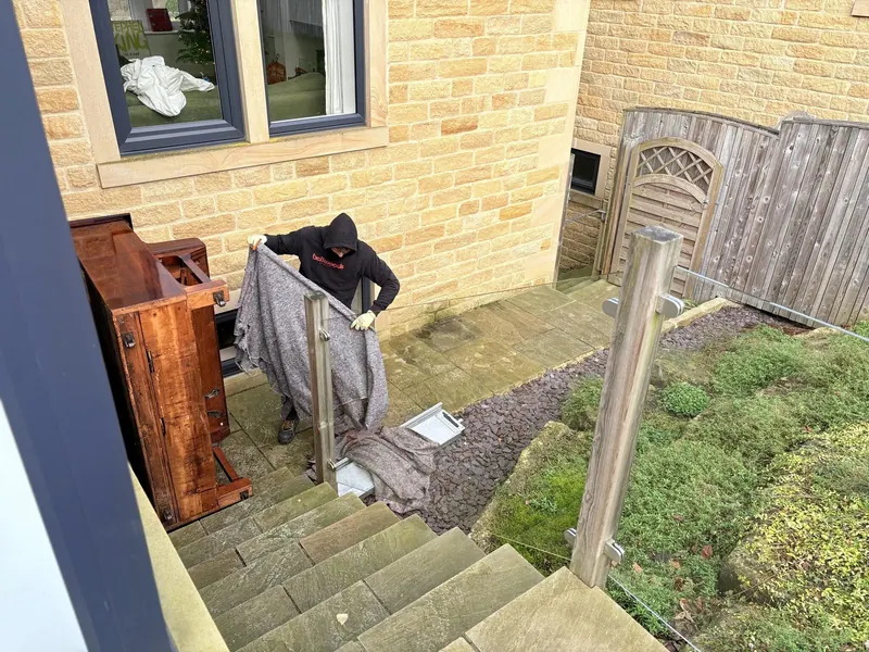 Moving a piano for disposal in North Yorkshire